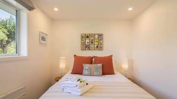 2 bedrooms, premium bedding, iron/ironing board, travel cot