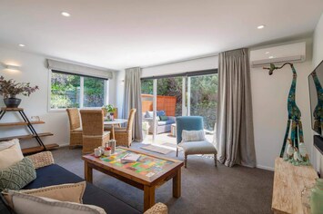 Enjoy a comfy and cozy lounge in your luxury accommodation in Queenstown