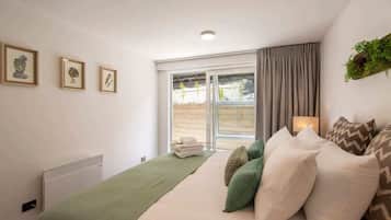 2 bedrooms, premium bedding, iron/ironing board, WiFi