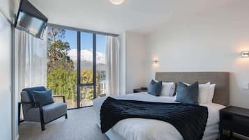 4 bedrooms, premium bedding, iron/ironing board, WiFi
