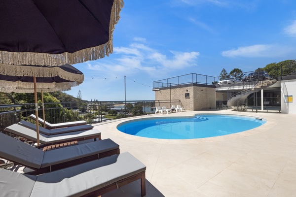 Outdoor pool, open 8:00 AM to 6:00 PM, pool loungers
