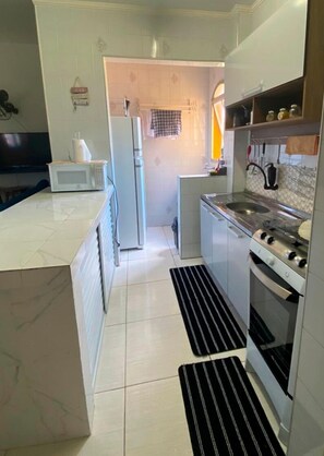 Private kitchen - Edifício Acapulco (Caraguatatuba)