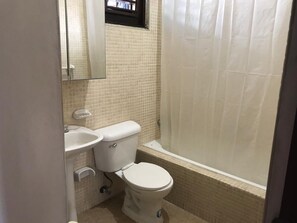 Combined shower/tub