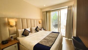 Ropa de cama de alta calidad, minibar, escritorio