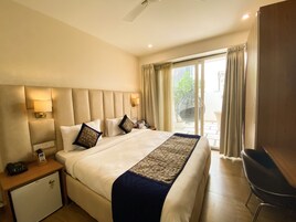 Premium bedding, minibar, desk, laptop workspace