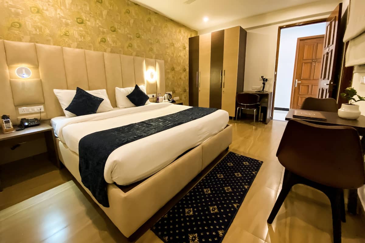 Premium bedding, minibar, desk, laptop workspace