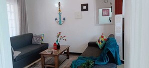 Luxury Apartment | Living room | TV - Cosmos Haven Apartment (Kisumu)