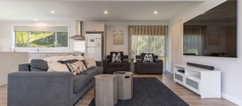 The Lazy Seal This newly renovated two storey four bedroom property offers modern, light and airy op