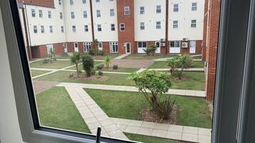 Apartamento conforto | Vista do quarto