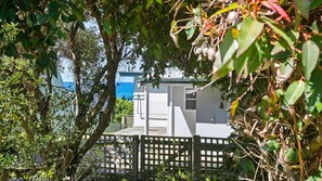 Enjoy a tranquil seaside retreat with a view of the sea from this coastal accommodation.