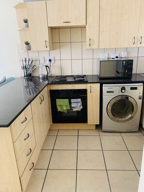 Een magnetron, een oven, een kookplaat