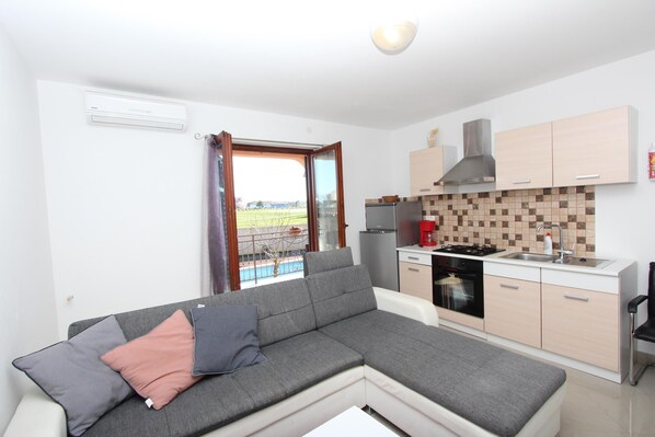 Apartment, 1 Schlafzimmer, Nichtraucher | Wohnbereich