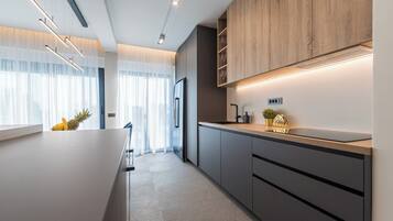 Exclusive Villa, Hot Tub, Beach View | Private kitchen | Full-sized fridge, microwave, oven, stovetop