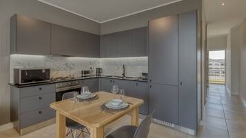 Classic Apartment | Private kitchen | Oven, stovetop, dishwasher, toaster