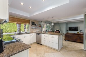 House, 4 Bedrooms | Private kitchen | Fridge, microwave, oven, dishwasher