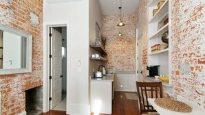 Coffee/tea maker, fridge, microwave, stovetop - Contemporary Marigny Apt on Frenchmen St. (New Orleans)