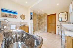 Bathtub, hair dryer, towels, soap