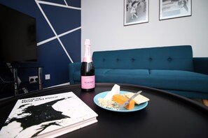 Appartement | Coin séjour | Télévision à écran plat de 32 pouces avec chaînes numériques, télévision