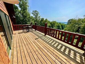 Outdoor dining - Luxe Log Cabin 3bd/4ba - Torch Lake Views, Private Trails & Premier Golf Nearby (Central Lake)
