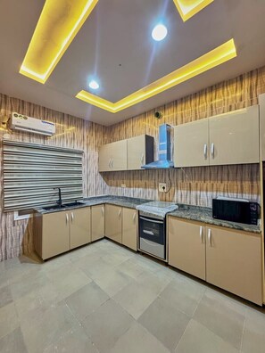 Fridge, microwave, oven, stovetop
