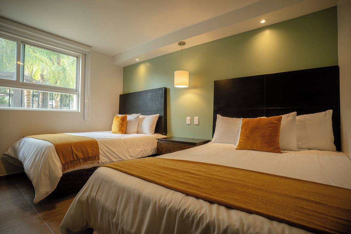 Family Double Room, 2 Bedrooms | Minibar, desk, laptop workspace, blackout drapes