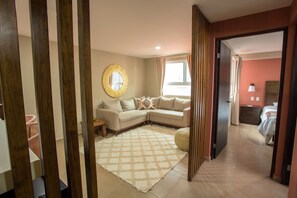Family Room | 1 bedroom, minibar, desk, laptop workspace