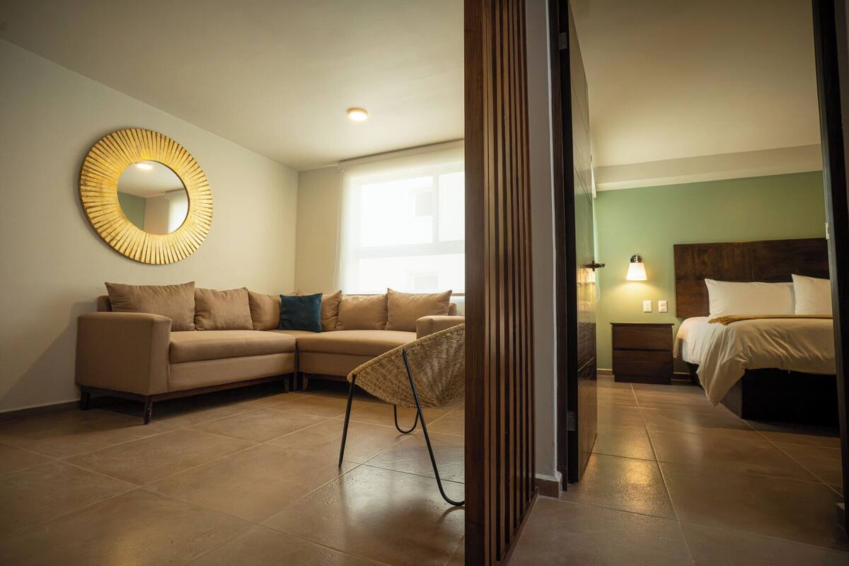Family Single Room | Living area | 42-inch flat-screen TV with cable channels, TV