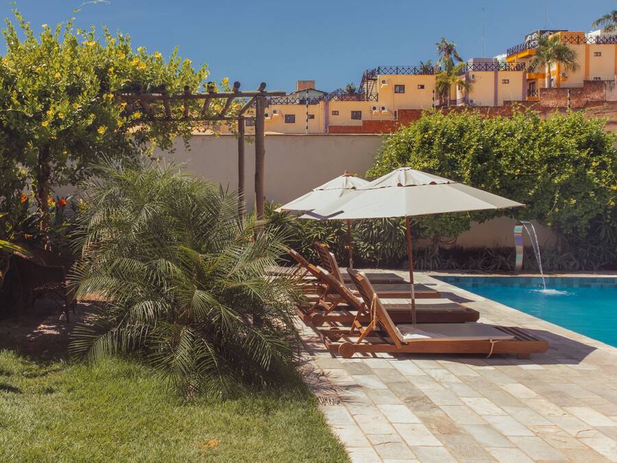 Outdoor pool, open 8:00 AM to 10:00 PM, sun loungers