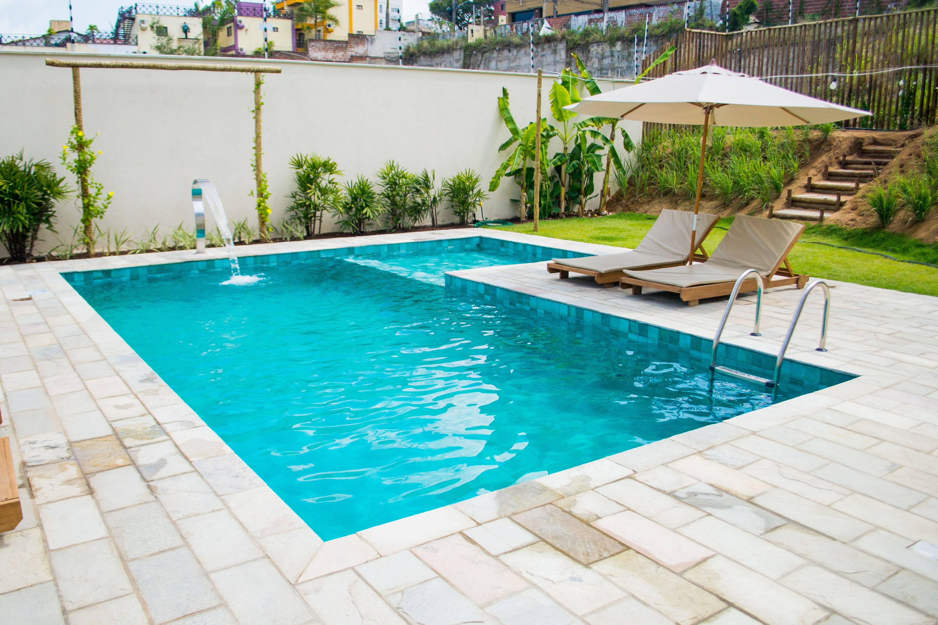 Outdoor pool, open 8:00 AM to 10:00 PM, sun loungers