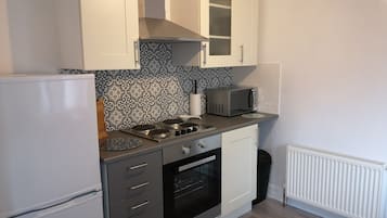 Apartment | Private kitchen | Fridge, microwave, oven, stovetop