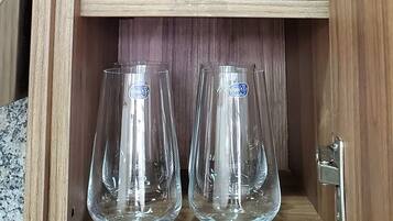 Deluxe Apartment | Private kitchen | Full-sized fridge, microwave, rice cooker, blender