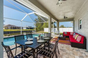 Outdoor dining - Waterfront Cape Coral Villa w/ Heated Pool, 4 Bedrooms, Pet-Friendly (Cape Coral)