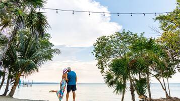 On the beach, sun loungers, beach towels