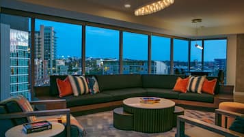 65-inch flat-screen TV with cable channels, TV