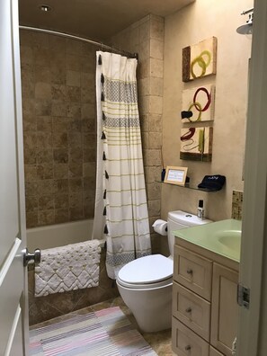 Hair dryer, towels, soap, shampoo