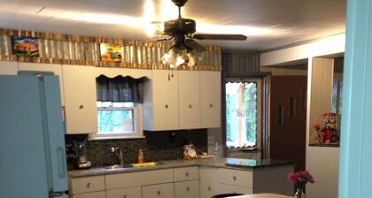 Three bedroom one bath home and 3 1/2 wooded acres