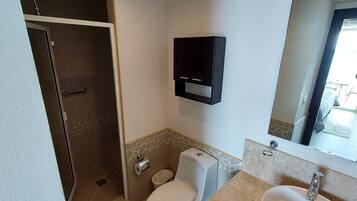 Shower, towels, soap, toilet paper