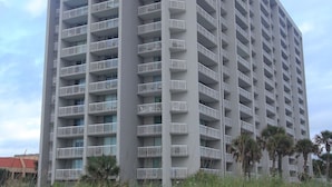 A high-rise building with multiple balconies and a flat roof. - Quiet second floor Beachfront Condo with two bedrooms and a sleeper sofa. (Myrtle Beach)