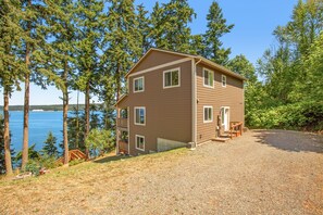 Exterior - Beachfront 3-story home w/deck, bay views, hot tub, game room, WiFi, EV charger (Port Hadlock)
