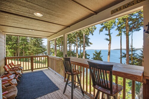 Beachfront 3-story home w/deck, bay views, hot tub, game room, WiFi, EV charger