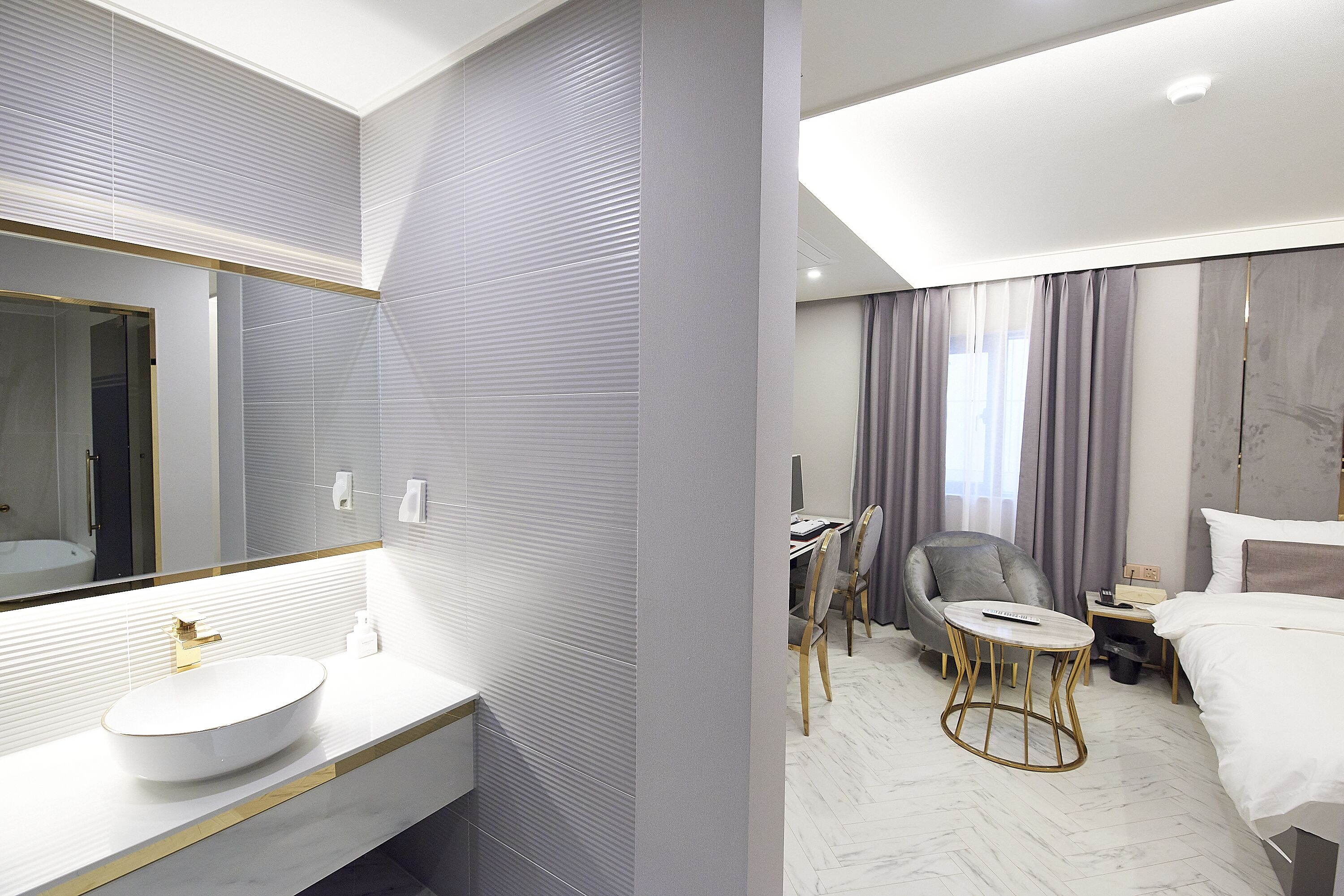 deluxe double room | premium bedding, down duvets, desk, laptop workspace