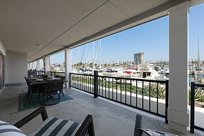 Outdoor dining - 106B New Renovation!  Huge Patio with Harbor View (Oceanside)