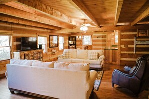 Älytelevisio, takka, DVD-soitin, pöytätennispöytä