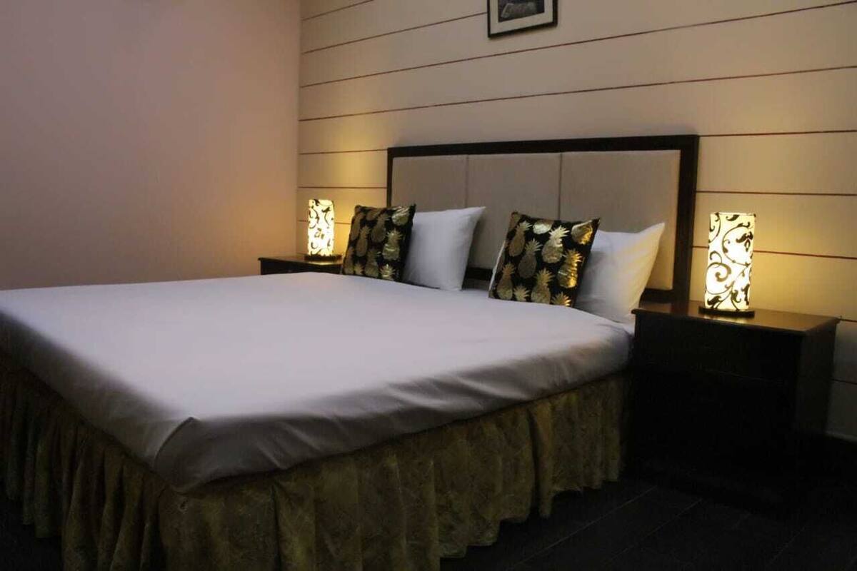 Deluxe kamer | Een bureau, gratis wifi, beddengoed