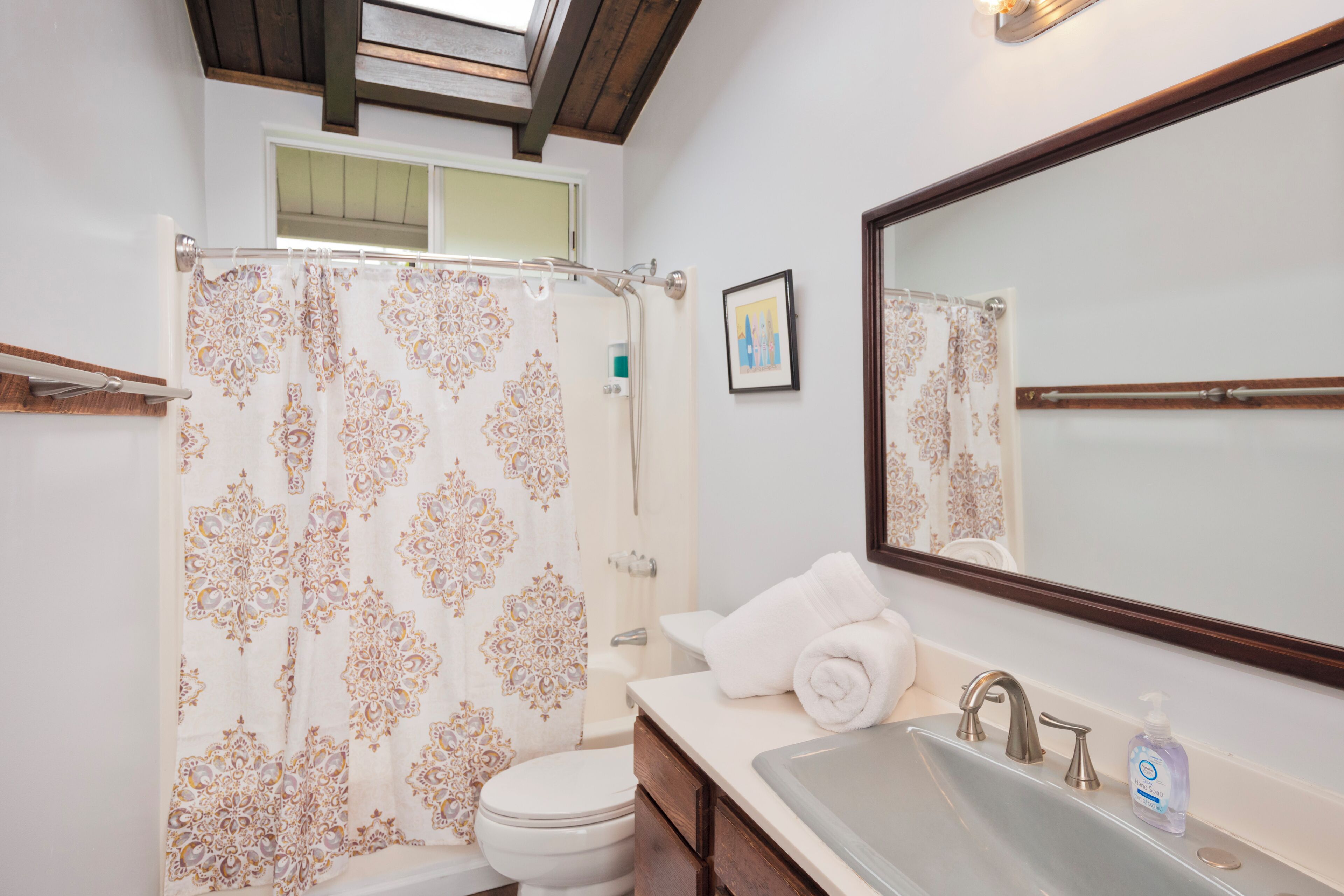 Bathtub, hair dryer, towels, soap