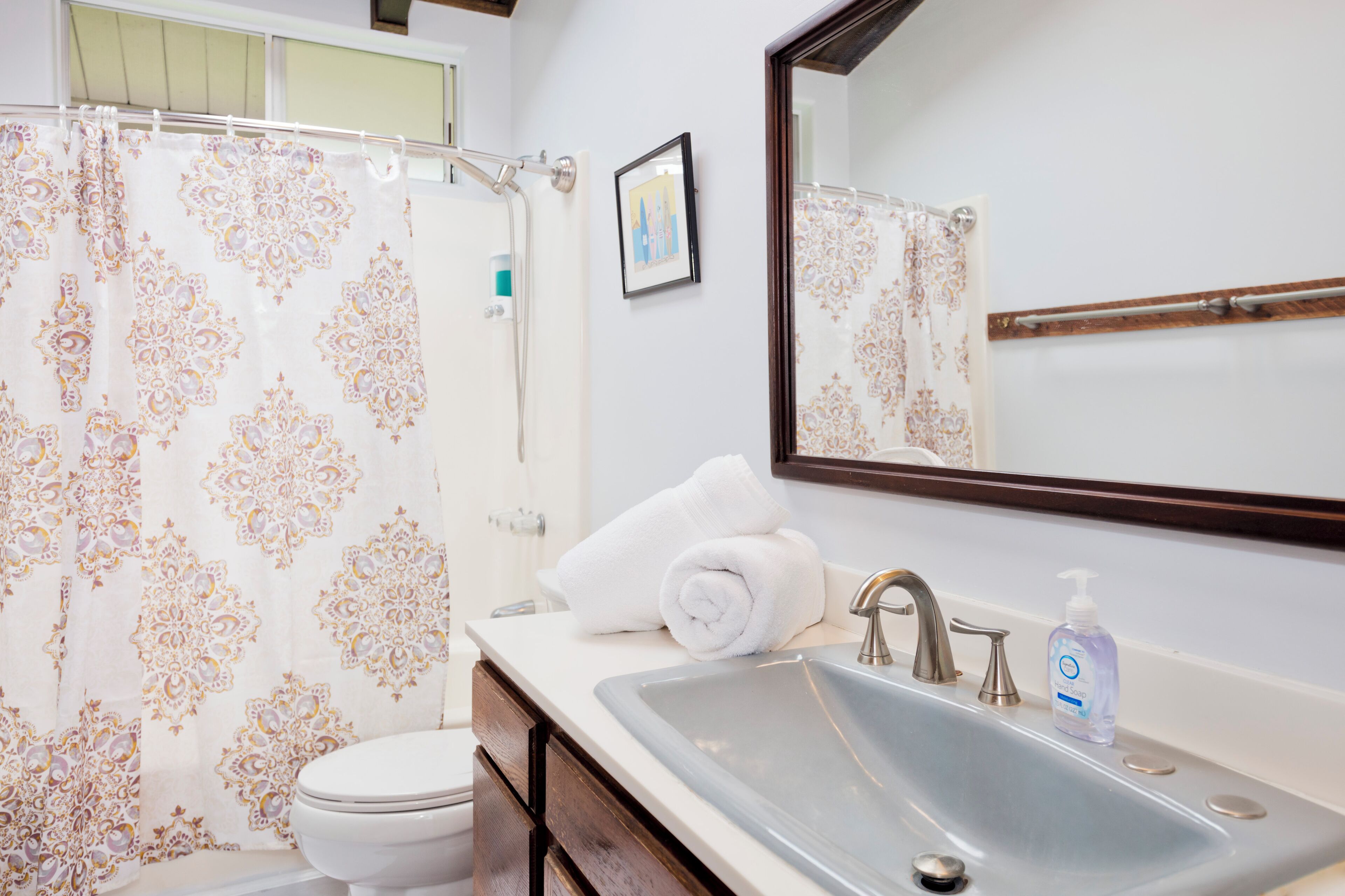 Bathtub, hair dryer, towels, soap