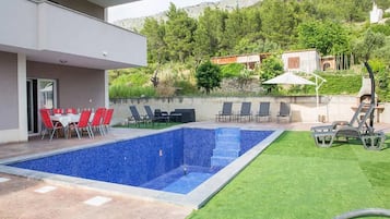 House (Nine Bedroom Holiday home with Swimmi) | Pool | Seasonal outdoor pool, pool umbrellas, sun loungers