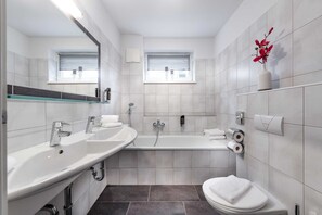 Hair dryer, towels, soap, toilet paper