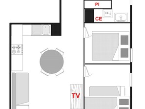 Un plan d’aménagement de chambre d’hôtel comprenant un lit, une télévision, une table à manger et un petit coin cuisine.