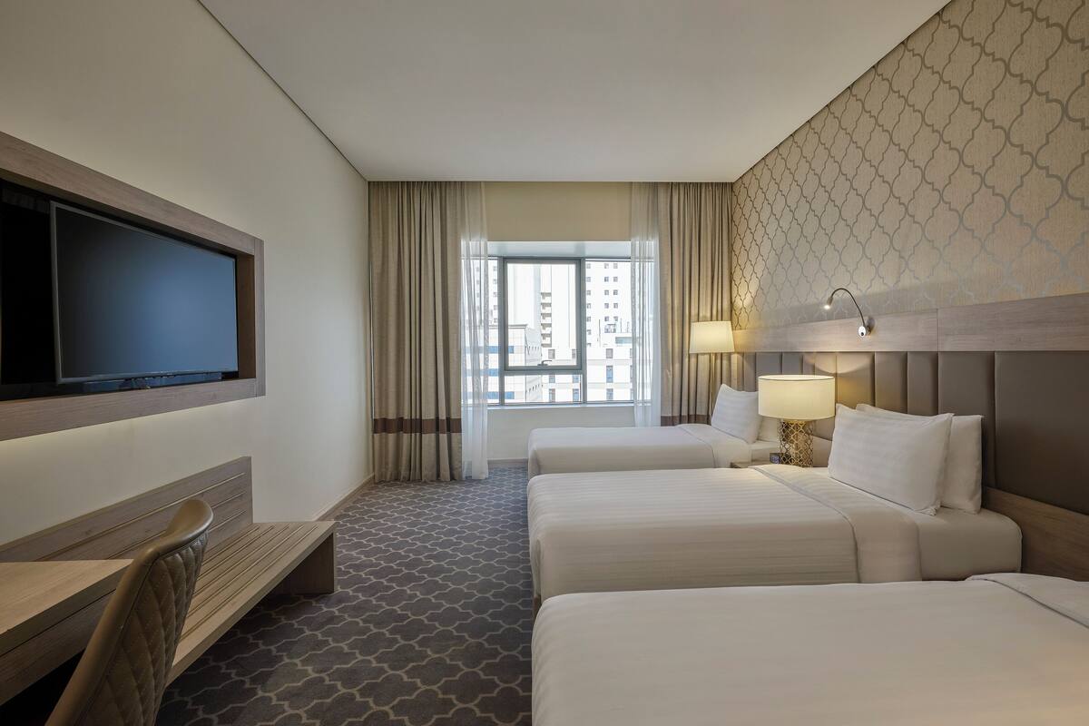 Deluxe Room, 3 Twin Beds, City View | In-room safe, soundproofing, iron/ironing board, WiFi (free)